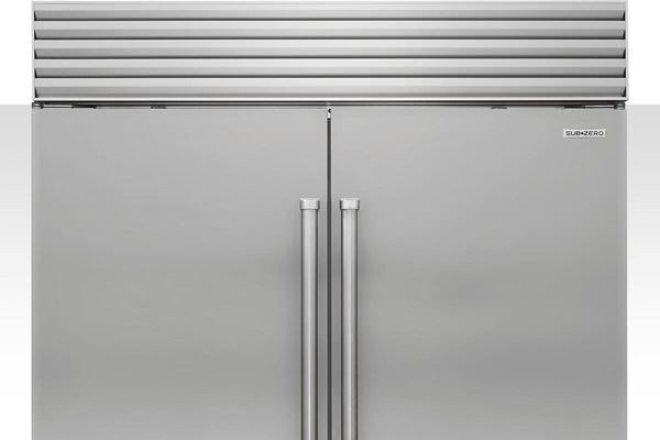 Technician repairing a Sub-Zero refrigerator